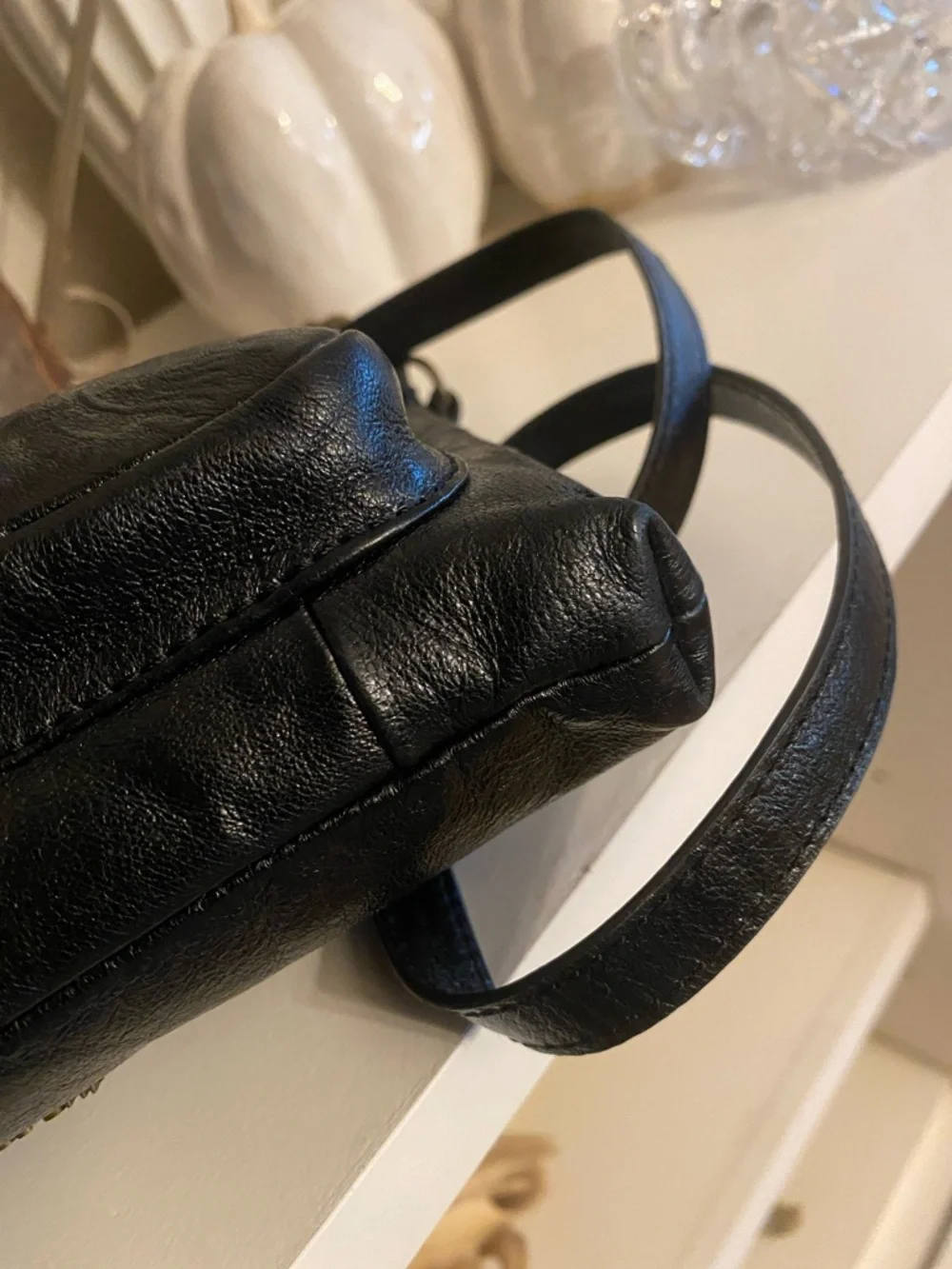 The Sak Sanibel Black Leather Floral Embossed Mini Crossbody w/ Gold Hardware - Picture 5 of 11